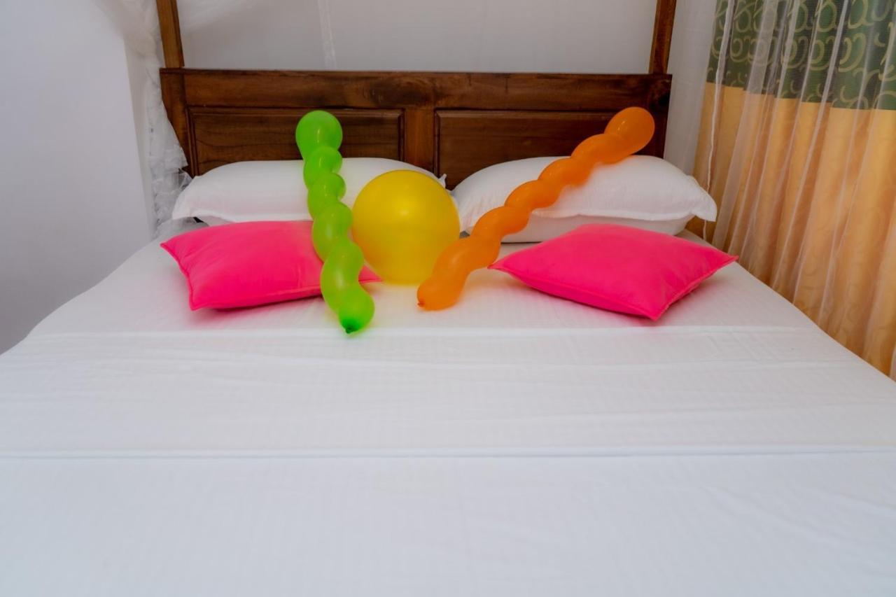 Rainforest Holiday Inn Деніяя Номер фото
